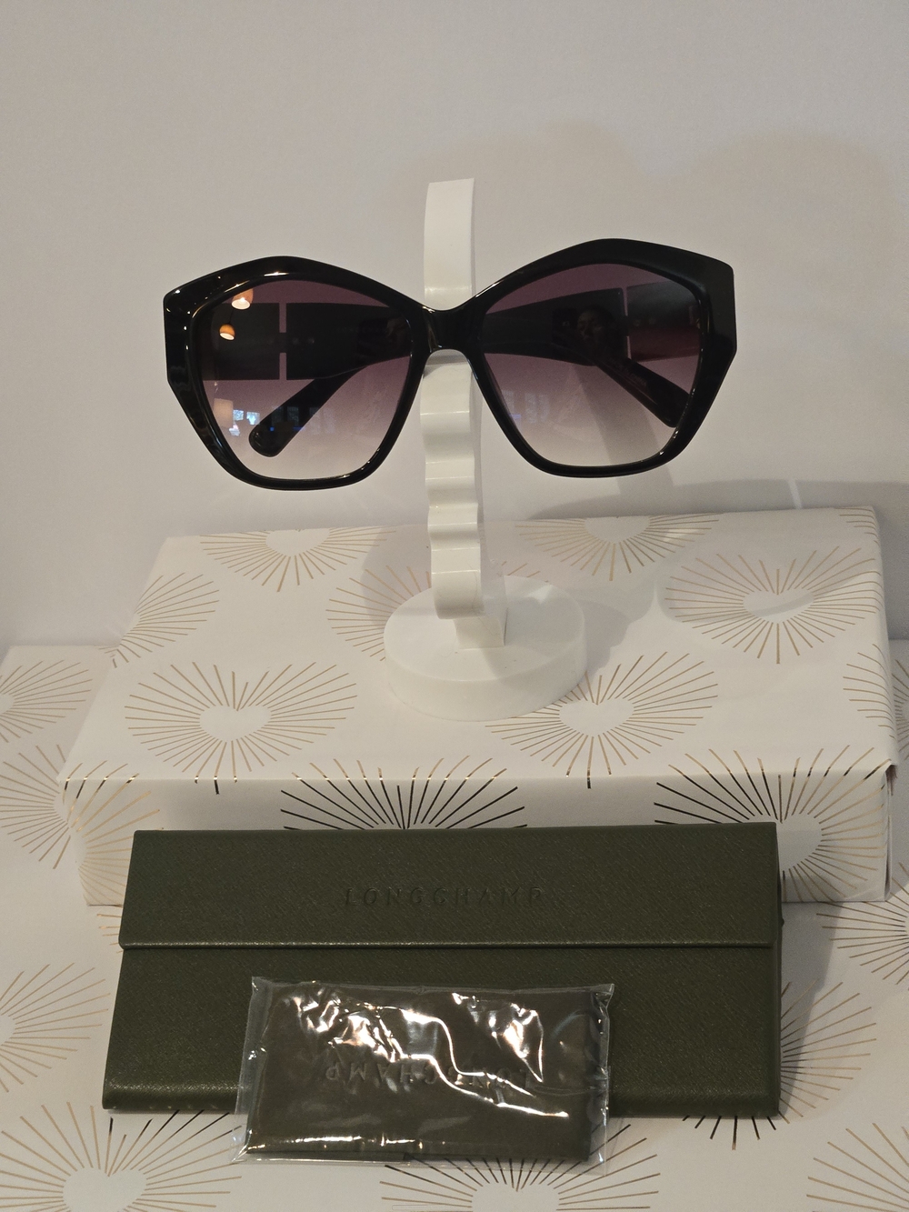 Longchamp Black Cat-Eye Sunglasses with Gradient Purple Lenses